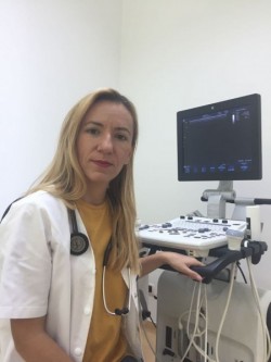 Dr. Andreea Ember